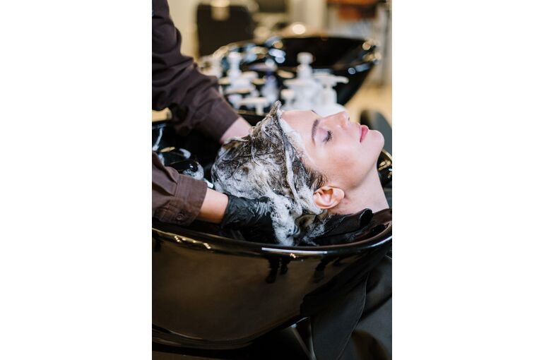 person-washing-woman-s-hair-3993449